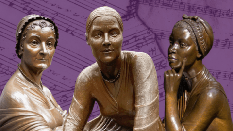 Three women statues.