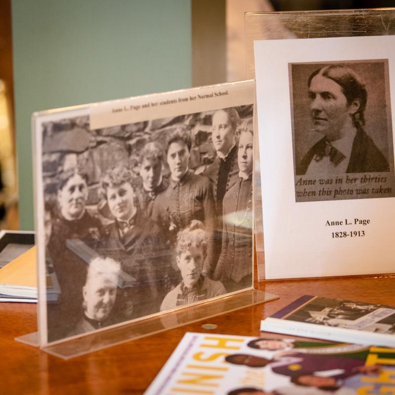 Old photographs on table.