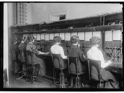 Black and white photograph of telephone operators.