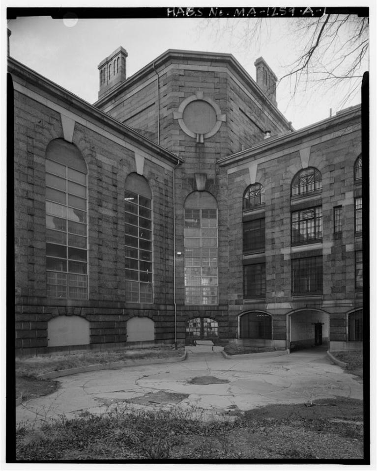 Black and white photograph of the exterior of the Charles Street Jail complex