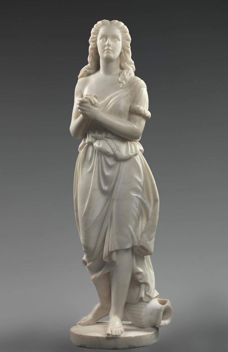 Carved marble sculpture of Hagar, the biblical handmaiden, standing with clasped hands.